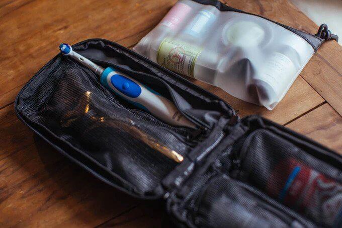 toiletry bag on wooden table